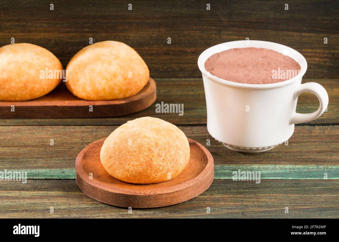 Delicious Colombian almojabanas for breakfast - Wooden background Stock Photo
