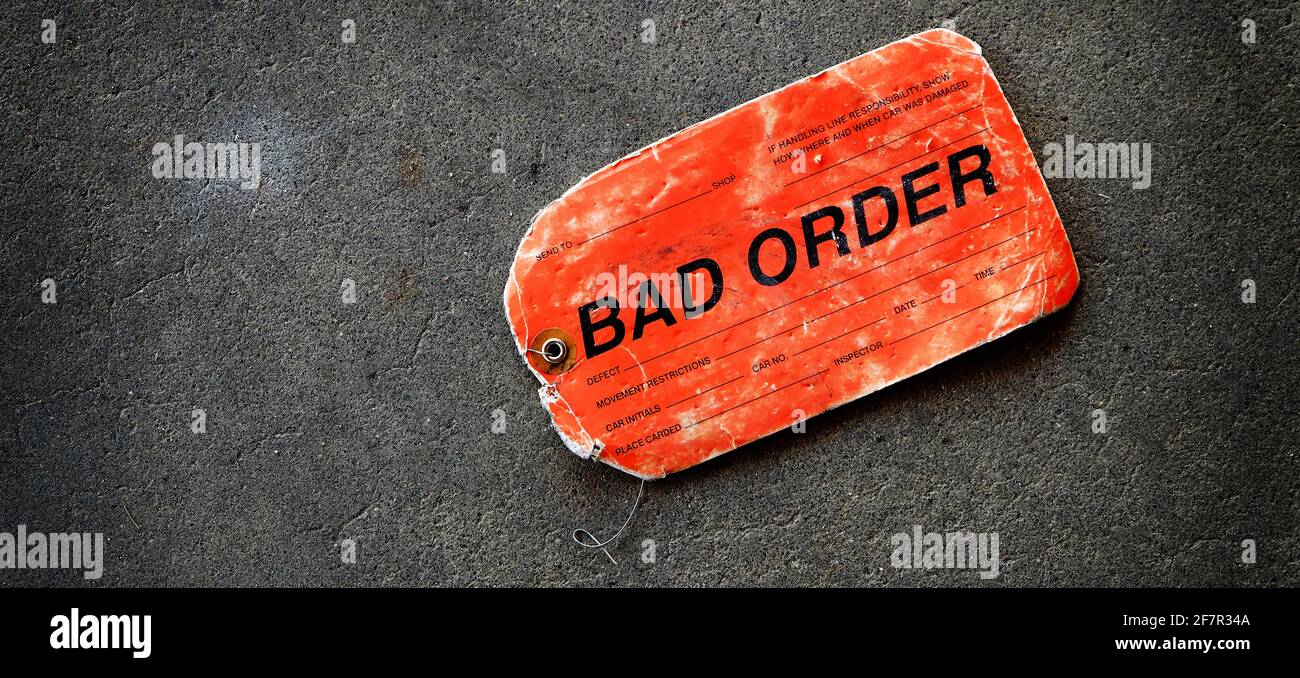 Red tag marker for bad order on ground paper Stock Photo Alamy