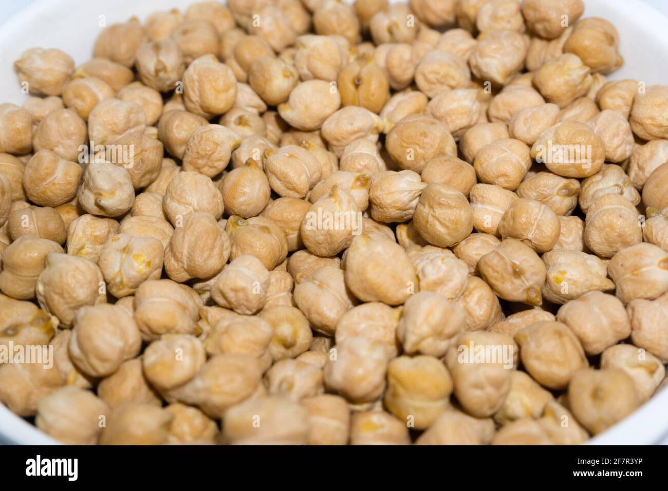 A close up shot of chickpeas in studio settings.Chickpeas, also known