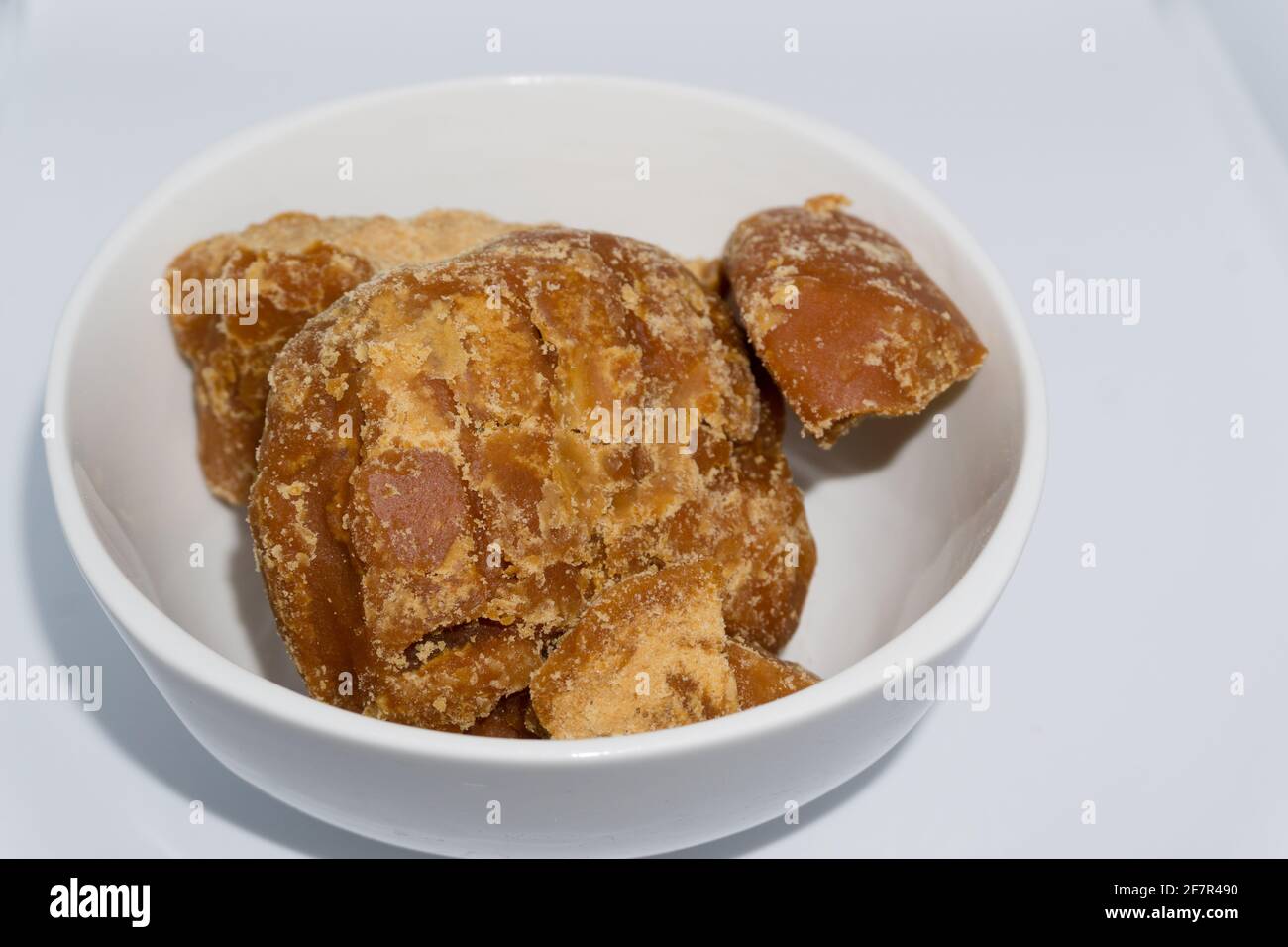 A close up shot of a bowl of Jaggery. It is a concentrated product of
