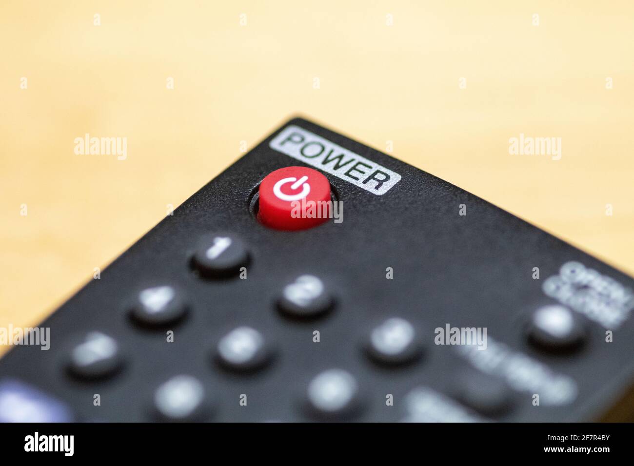 Red power button closeup on TV remote control Stock Photo Alamy