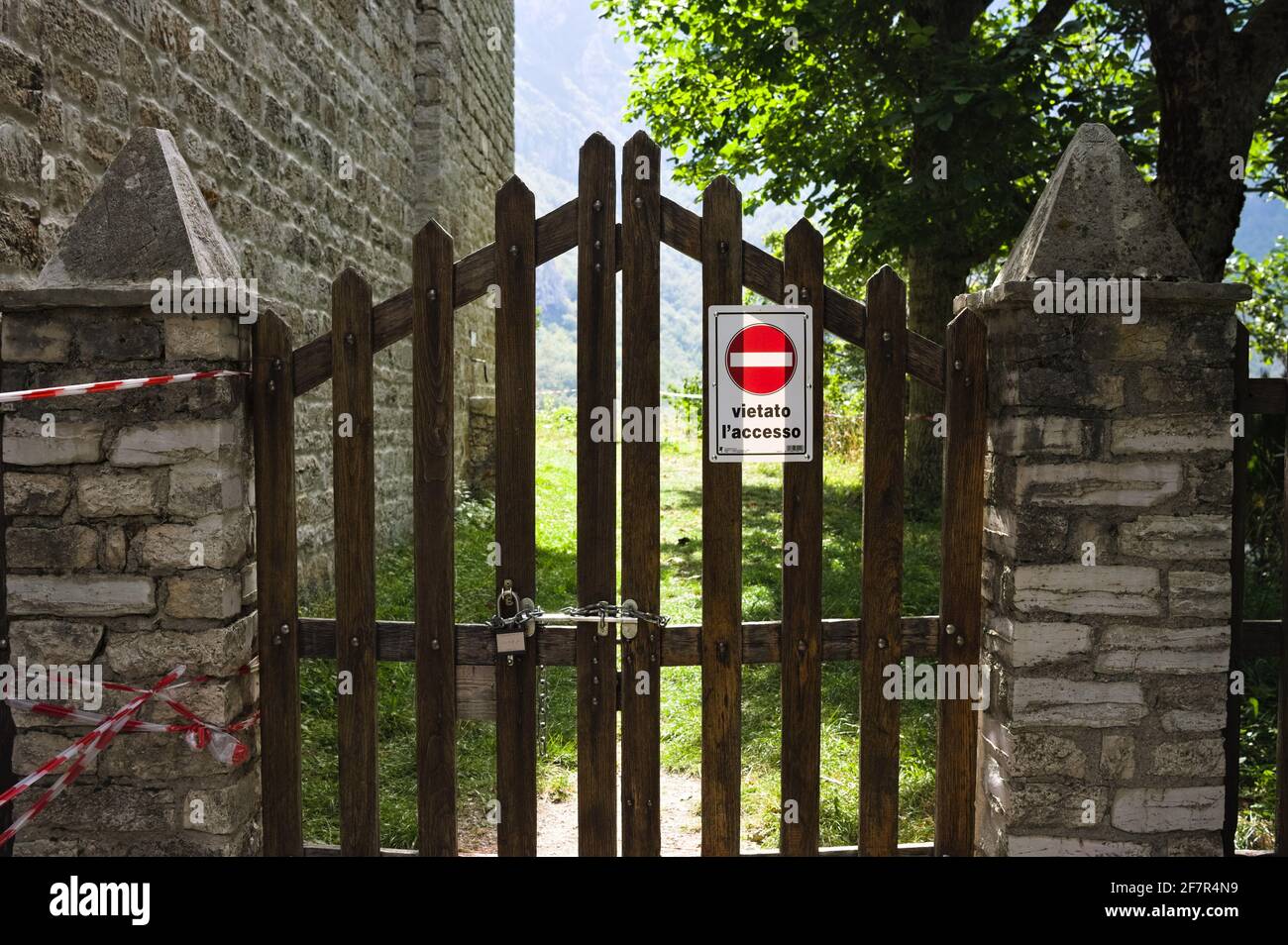 'vietato l'accesso' road sign that means 'no entry' hanging on the gate (Marche, Italy, Europe) Stock Photo