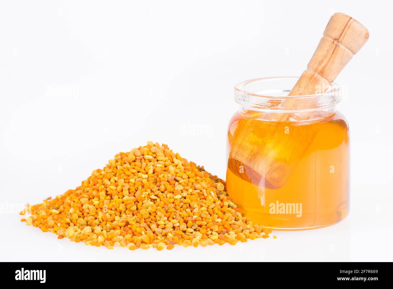 Bee honey and pollen grains Stock Photo