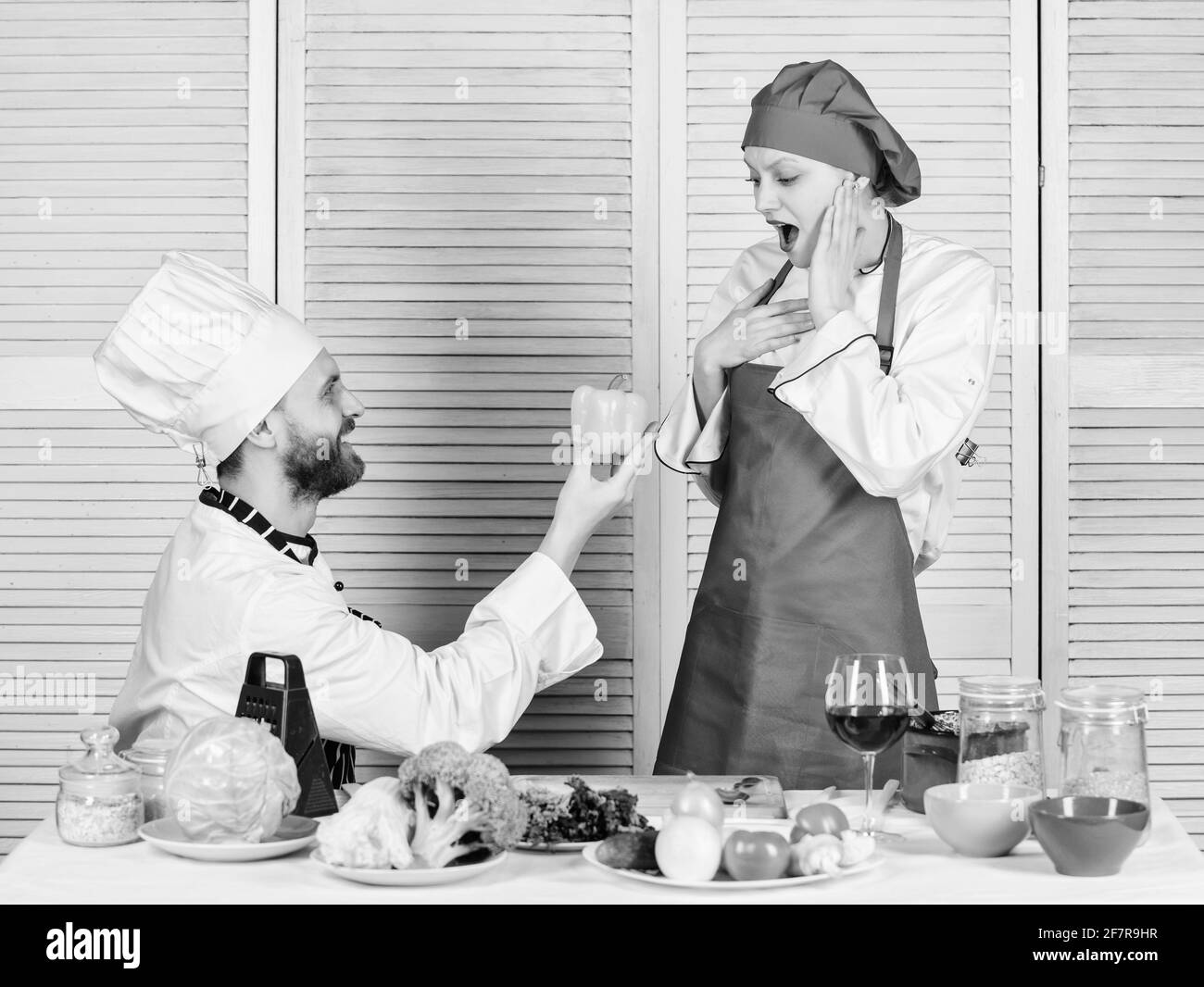 try this one. vegetarian. cook uniform. Dieting and vitamin. culinary cuisine. Family cooking in kitchen. happy couple in love with healthy food. man Stock Photo