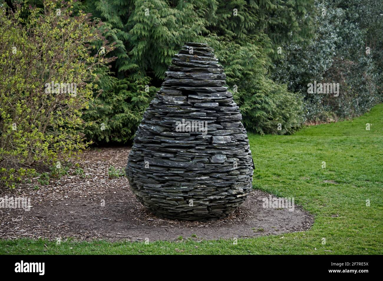 Slate Cone made from Ballachulish slate by British artist Andy Goldsworthy in the grounds of the Royal Botanic Garden Edinburgh, Scotland, UK. Stock Photo