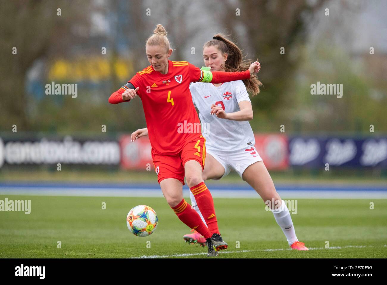 Cardiff, Wales, UK. 9th Apr, 2021. Sophie Ingle of Wales and Jordyn Huitema of Canada during the friendly international match between Wales Women and Canada Women at Leckwith Stadium in Cardiff. Credit: Mark Hawkins/Alamy Live News Stock Photo