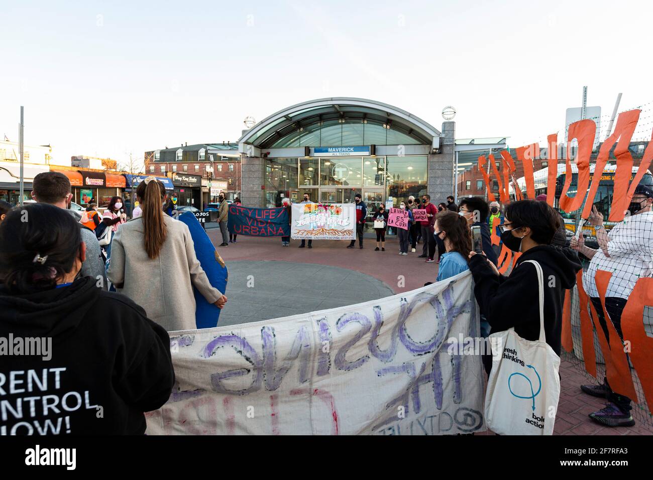 April 8, 2021. East Boston, MA. Marchers gathered in front of 168 Gove St. in East Boston, Massachusetts, an apartment building where Latinx immigrant Stock Photo