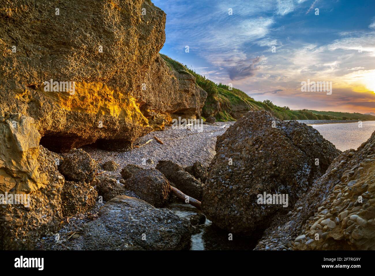 Sunset on the cliffs and on the small cove of Punta Aderci in Vasto. Vasto, Chieti province, Abruzzo, Italy, Europe Stock Photo