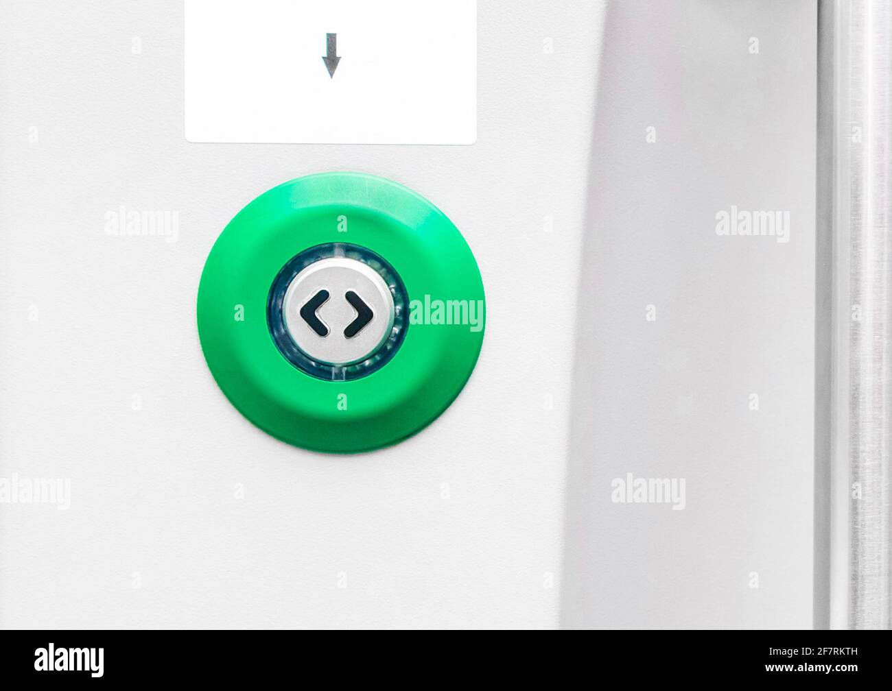 green emergency exit button to open door press here Stock Photo - Alamy