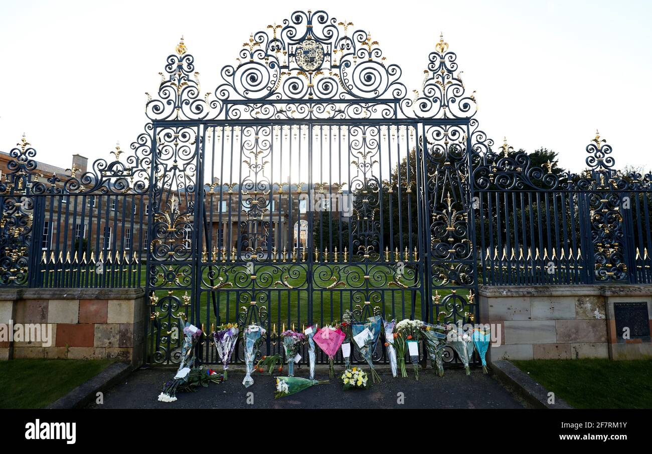 Bouquets of flowers are seen outside Hillsborough Castle after Britain's Prince Philip, husband of Queen Elizabeth, died at the age of 99, in Hillsborough, Northern Ireland, April 9, 2021. REUTERS/Jason Cairnduff Stock Photo