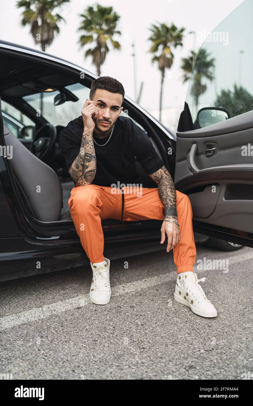 Stylish Young Male Posing by a Car Stock Photo - Image of adult, outside:  10019032