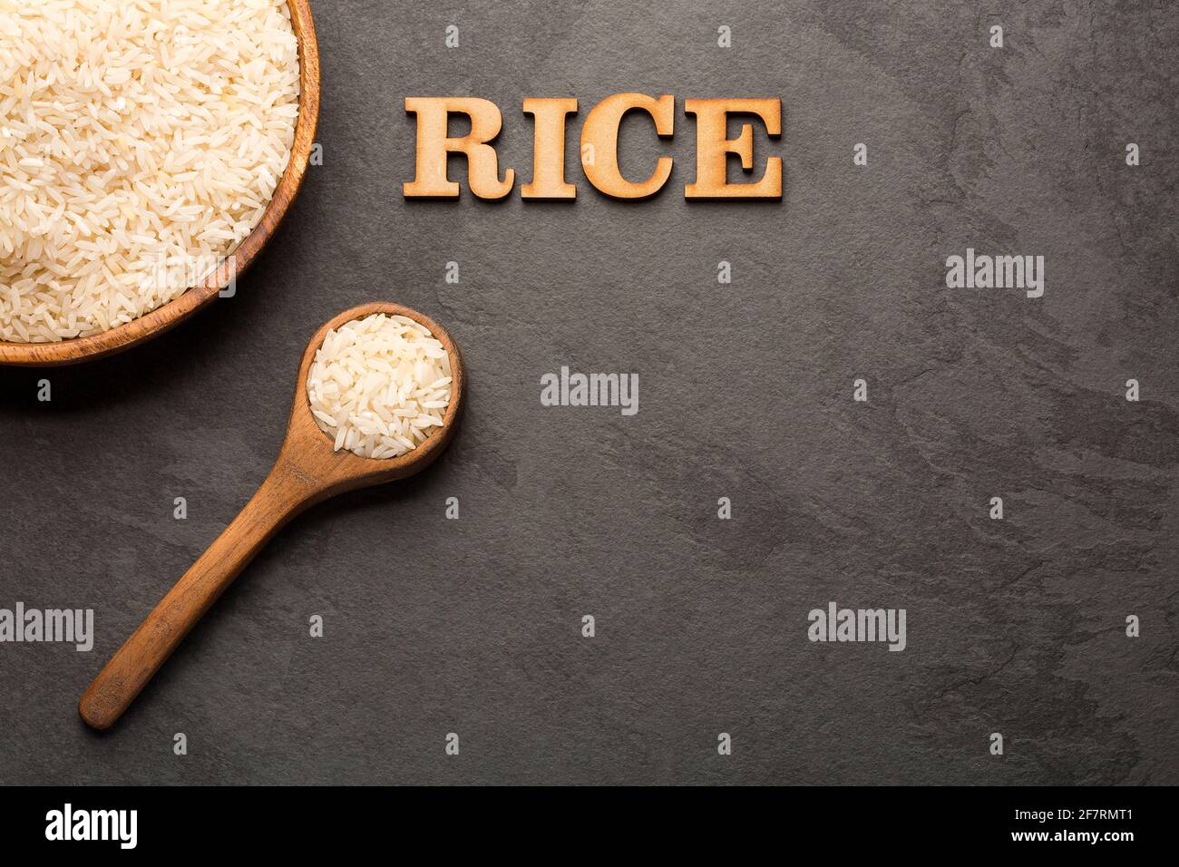 White organic raw rice - Oryza sativa. Text space Stock Photo - Alamy