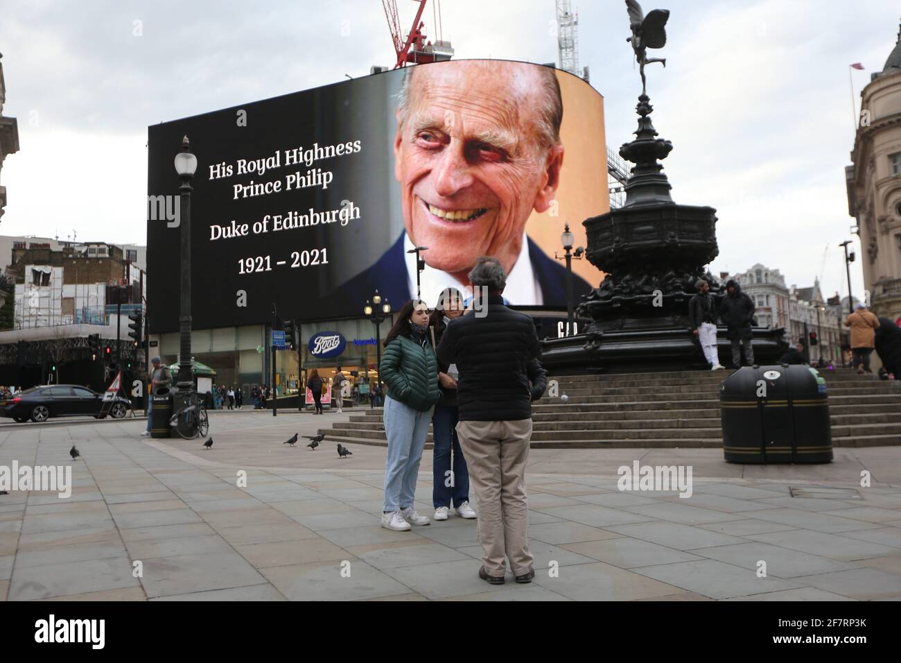 London, England, UK. 9th Apr, 2021. Prince Philips picture is displayed on the big screen at Piccadilly Circus as a tribute after the official announcement his death. Philip died at the age of 99 today. Credit: Tayfun Salci/ZUMA Wire/Alamy Live News Stock Photo