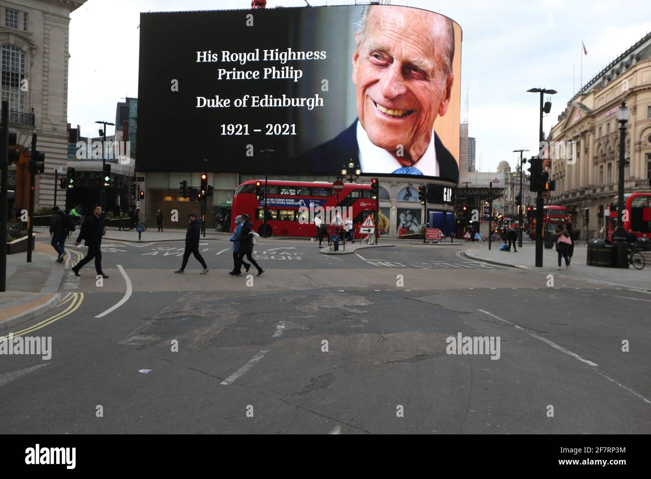 London, England, UK. 9th Apr, 2021. Prince Philips picture is displayed on the big screen at Piccadilly Circus as a tribute after the official announcement his death. Philip died at the age of 99 today. Credit: Tayfun Salci/ZUMA Wire/Alamy Live News Stock Photo