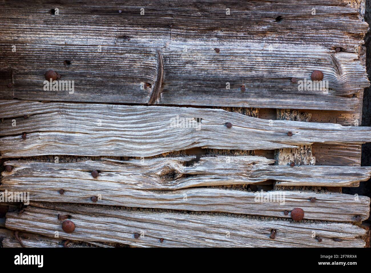 Weathered, broken, old wood texture detail. Natural background Stock