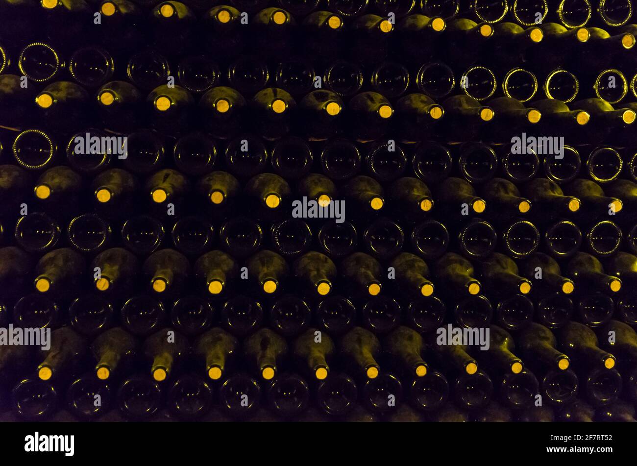 Wine bottles stored in the underground cellar for aging Stock Photo Alamy