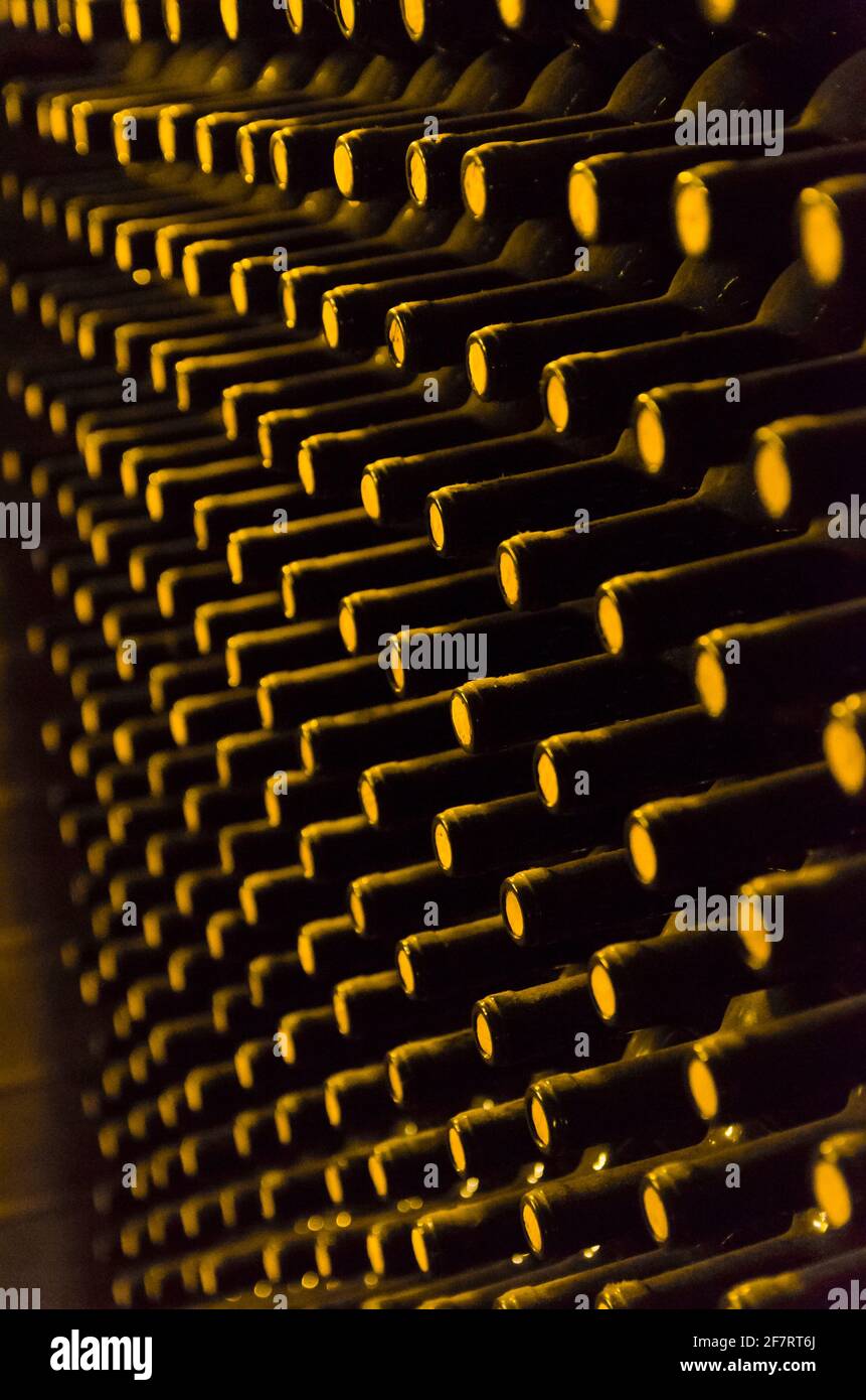 Wine bottles stored in the underground cellar for aging Stock Photo Alamy