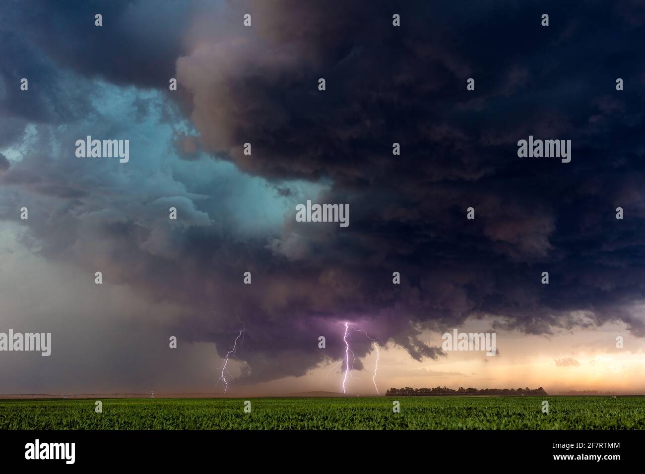 Stormy sky with lightning bolt strikes as a severe thunderstorm approaches Valentine, Nebraska Stock Photo