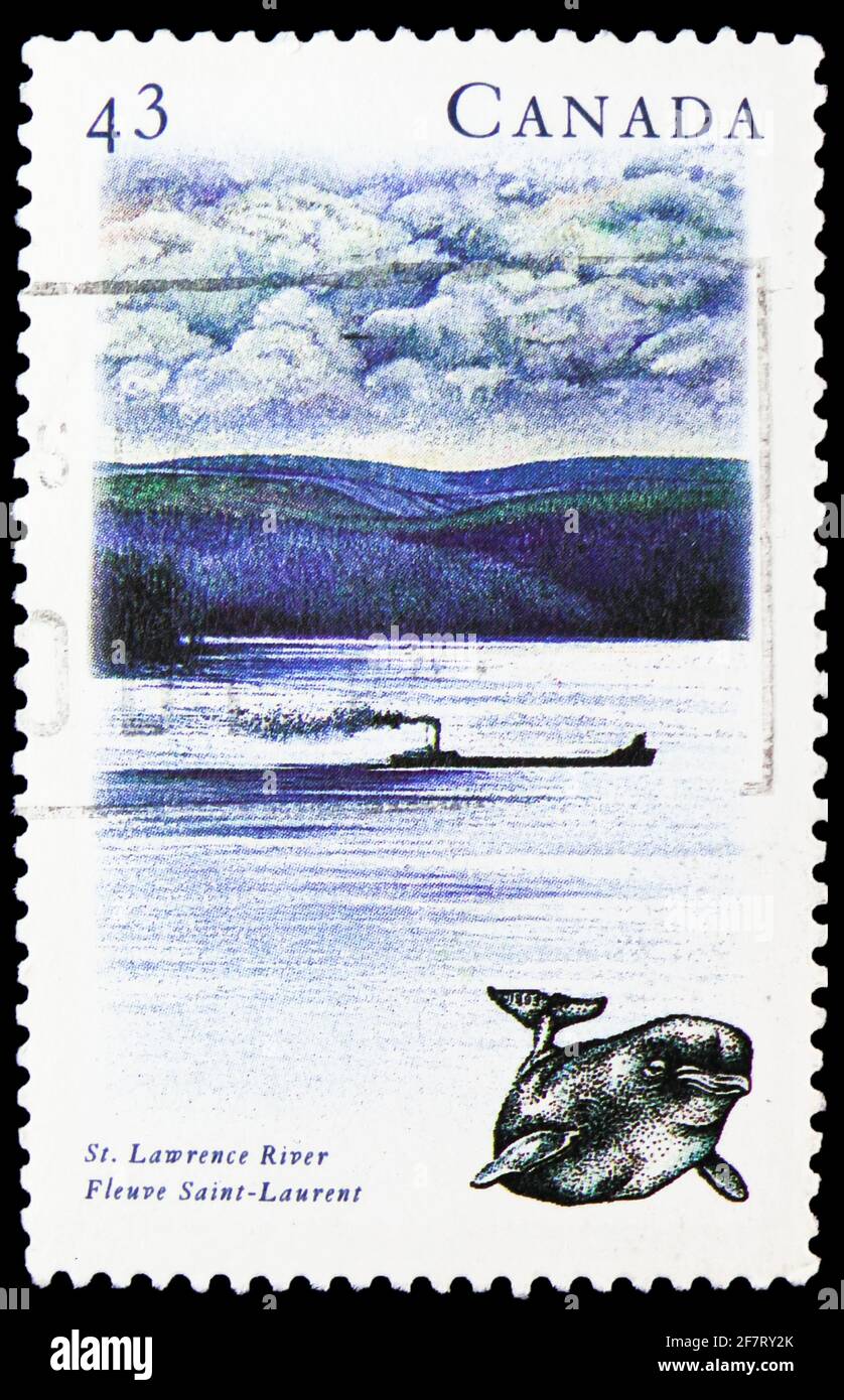 MOSCOW, RUSSIA - JANUARY 17, 2021: Postage stamp printed in Canada shows St. Lawrence River, Ontario and Quebec - Dolphin, Canadian Rivers (3rd series Stock Photo