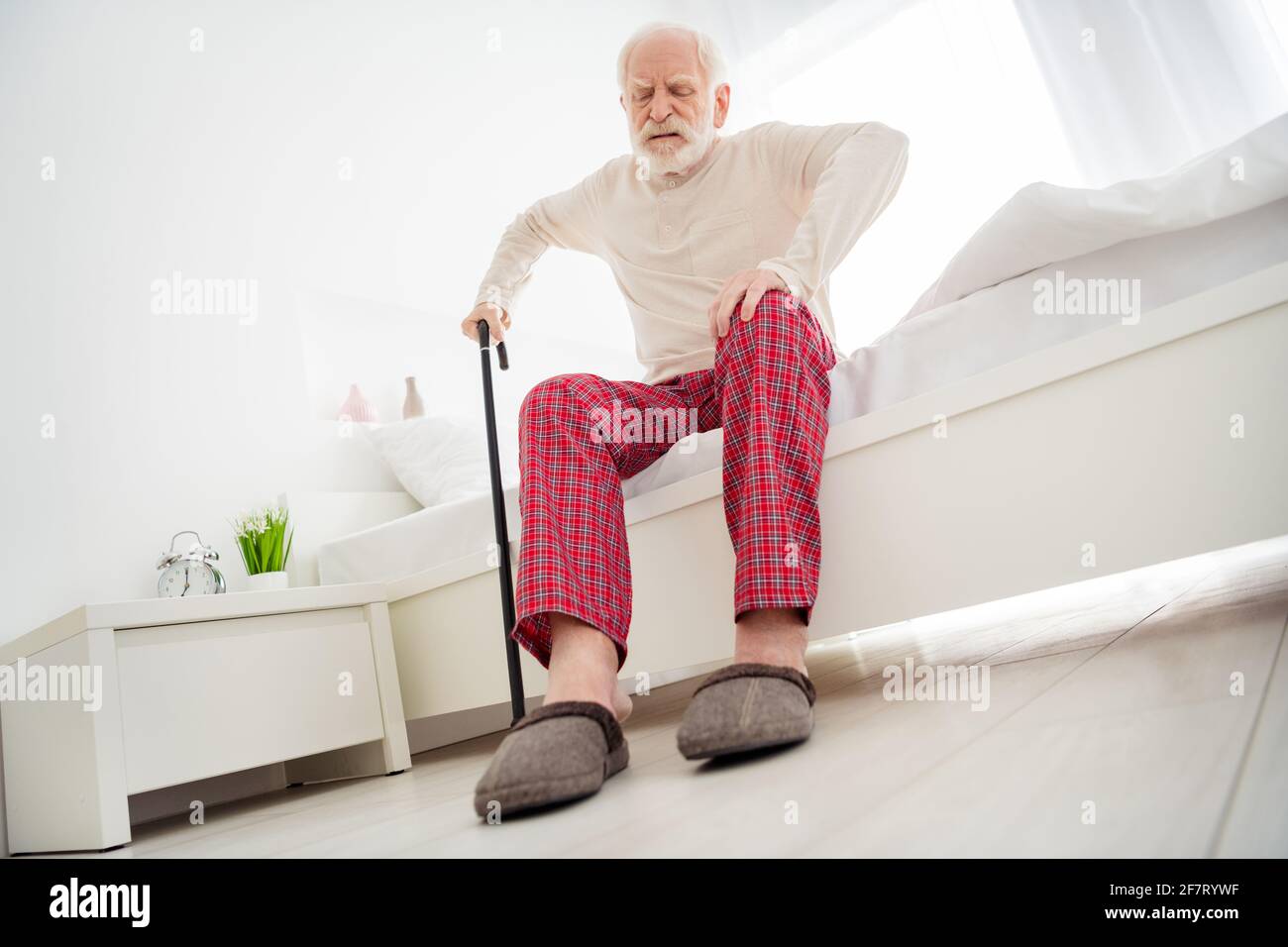 Sad lonely aged man walking hi-res stock photography and images - Alamy