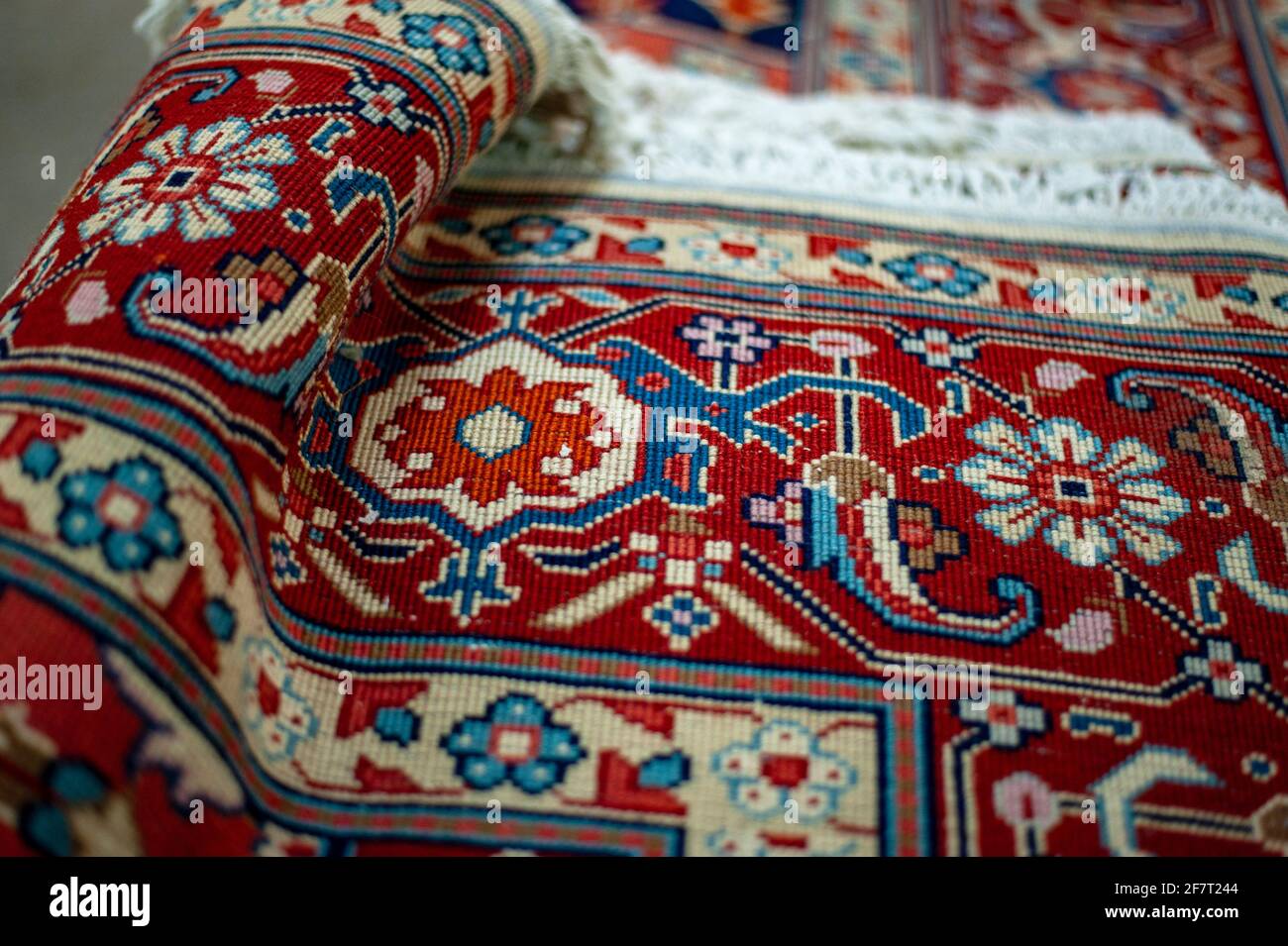 Beautiful oriental patterns and ornaments on a Persian rug in Iran Stock Photo