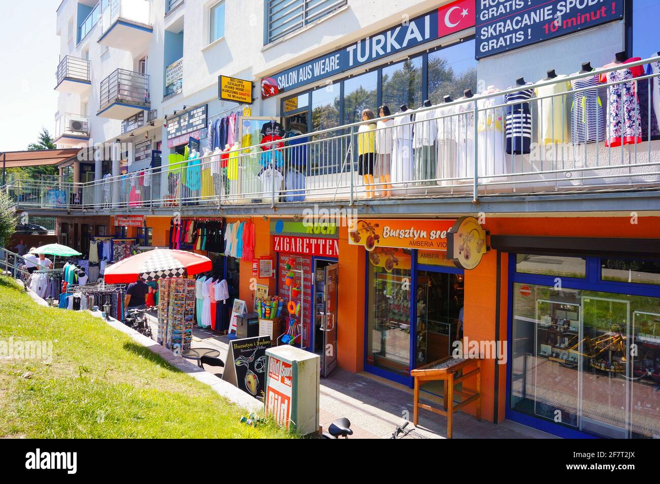 KOLOBRZEG, POLAND Oct 16, 2015 Row of small shops and stors selling