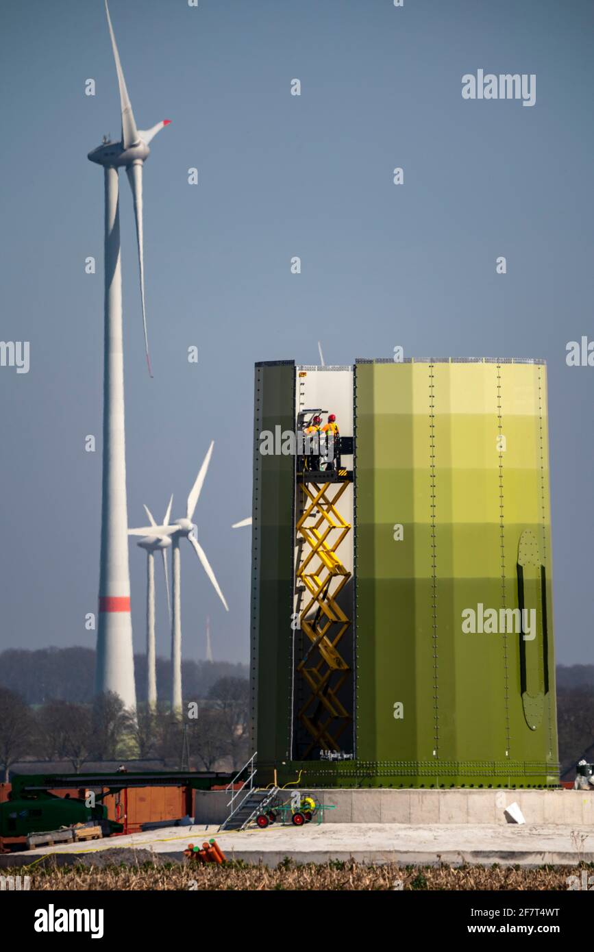 Construction of a wind turbine, steel pillar by Enercon, near Kerken, Kleve district, on the Lower Rhine, NRW, Germany, Stock Photo