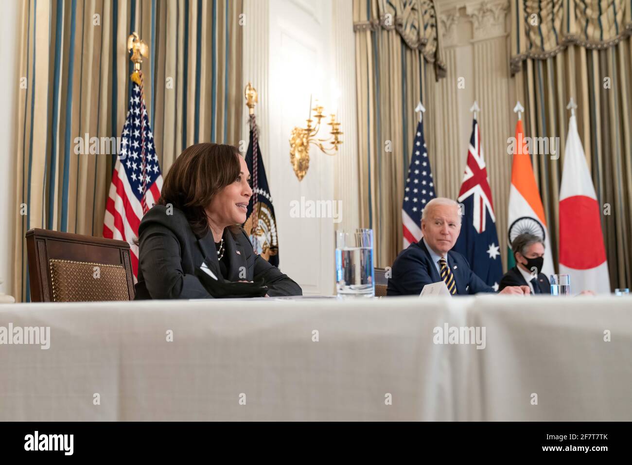 President Joe Biden, joined by Vice President Kamala Harris, Secretary of State Antony Blinken and White House staff, participates in the virtual Quad Summit with Australia, India, and Japan Friday, March 12, 2021, in the State Dining Room of the White House. (Official White House Photo by Adam Schultz) Stock Photo