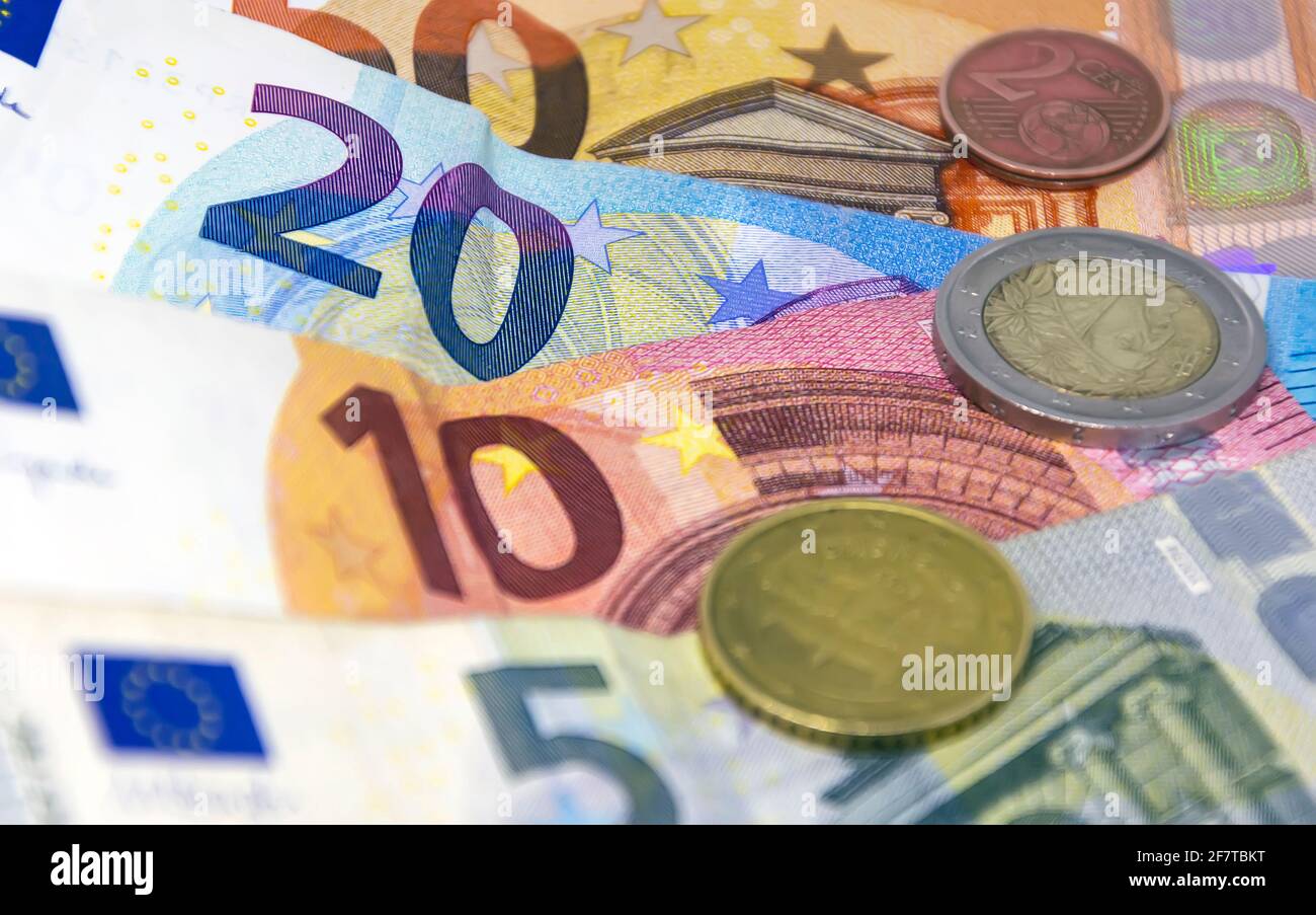 European Union coins and banknotes of different values. The euro is the European currency. Finance, economy and business. Cash and savings Stock Photo