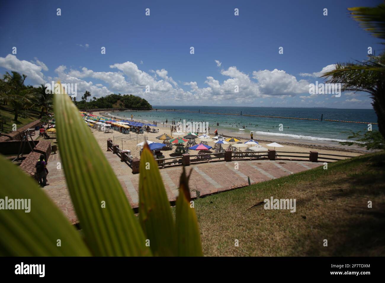 salvador, bahia / brazil - january 31, 2018: People are seen on the Nossa Senhora de Gaudalupe beach on Frades Island in th city of Salvador. *** Loca Stock Photo