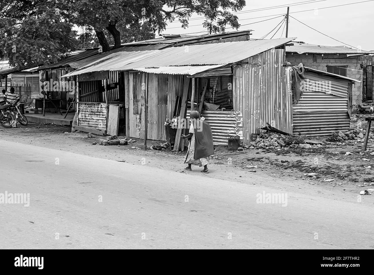March, 18, 2020 - Nungwi, Tanzania: real street life at day on road black and white Stock Photo