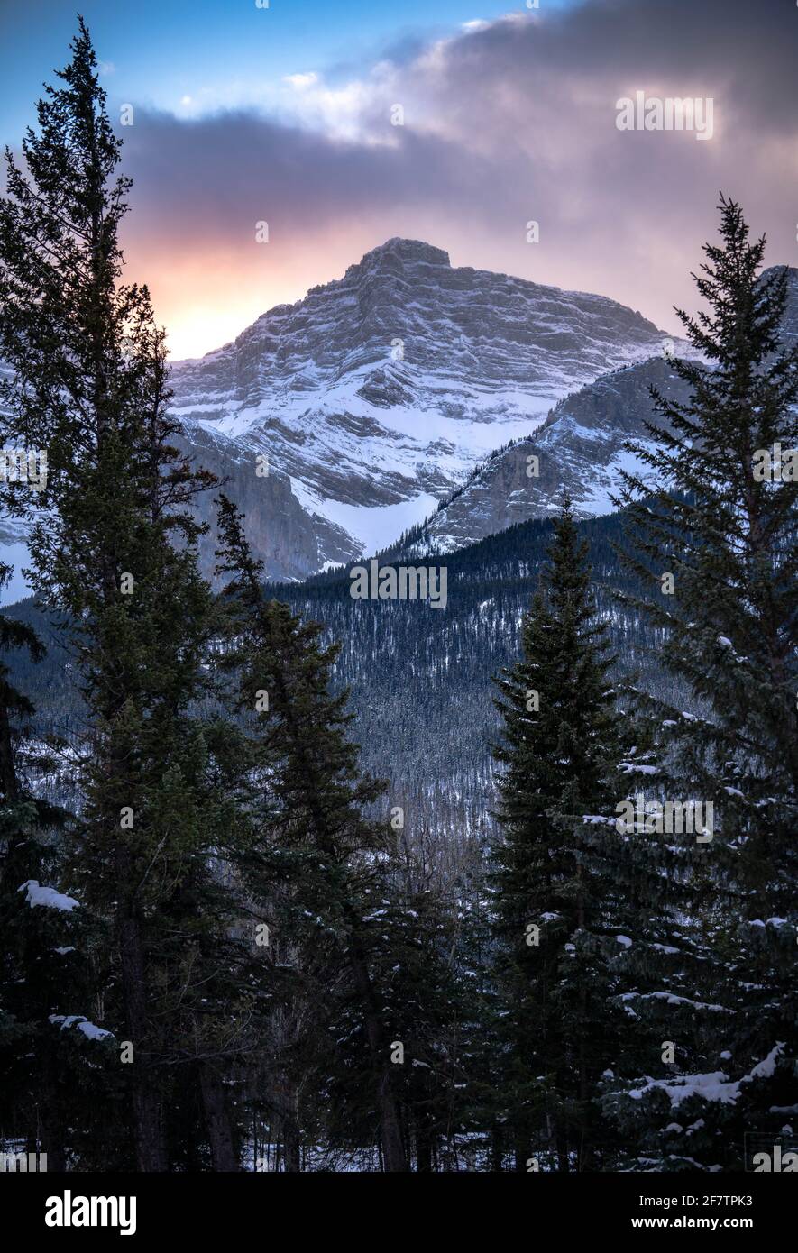 Stunning Banff scenery rocky mountains in winter at dusk sunset Stock Photo
