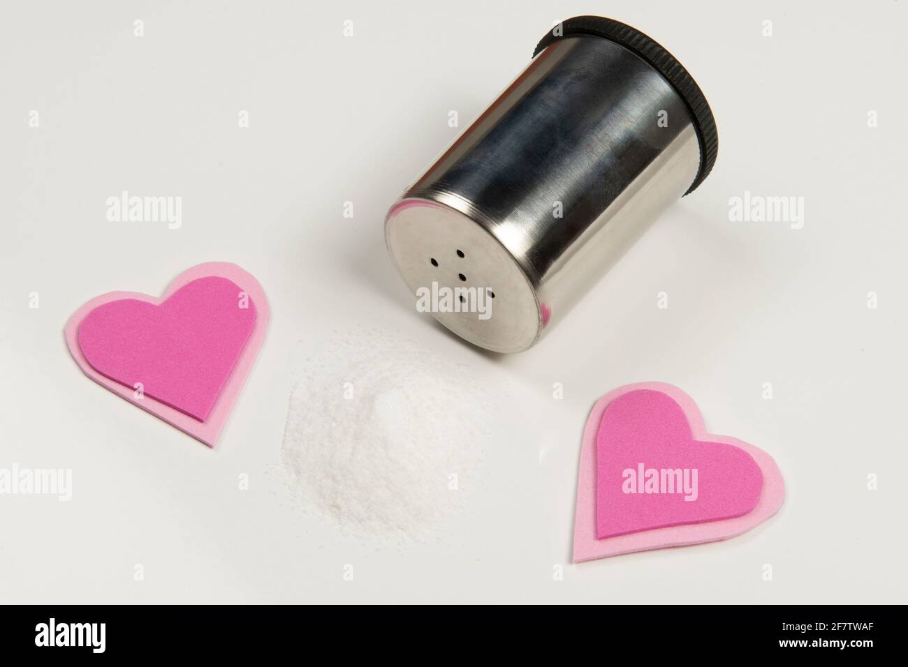 Salt causing high blood pressure and heart comorbidities Stock Photo