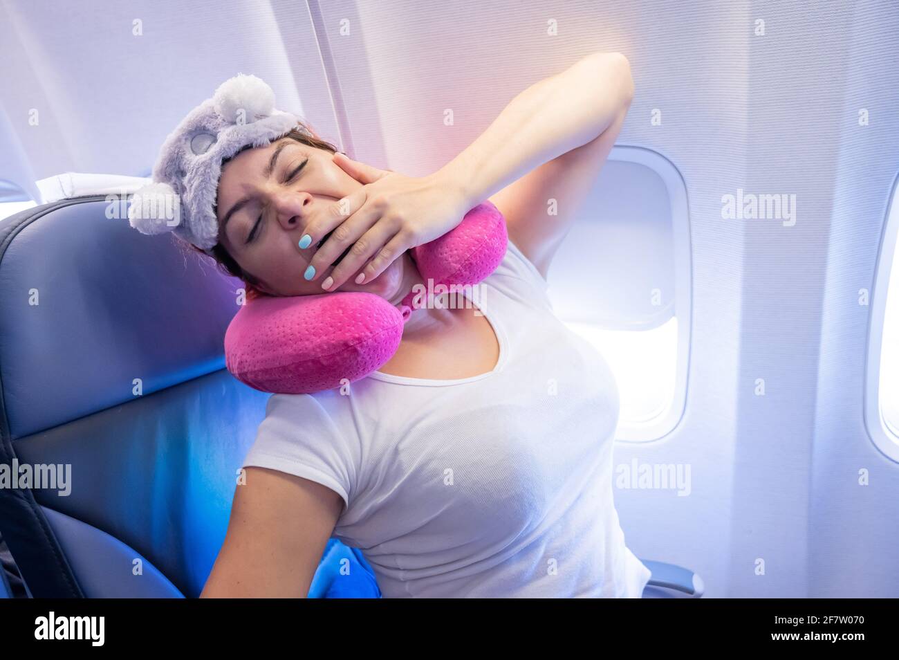 Woman sleeping plane hires stock photography and images Alamy