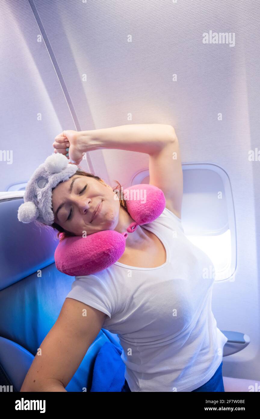 Woman sleeping plane hires stock photography and images Alamy