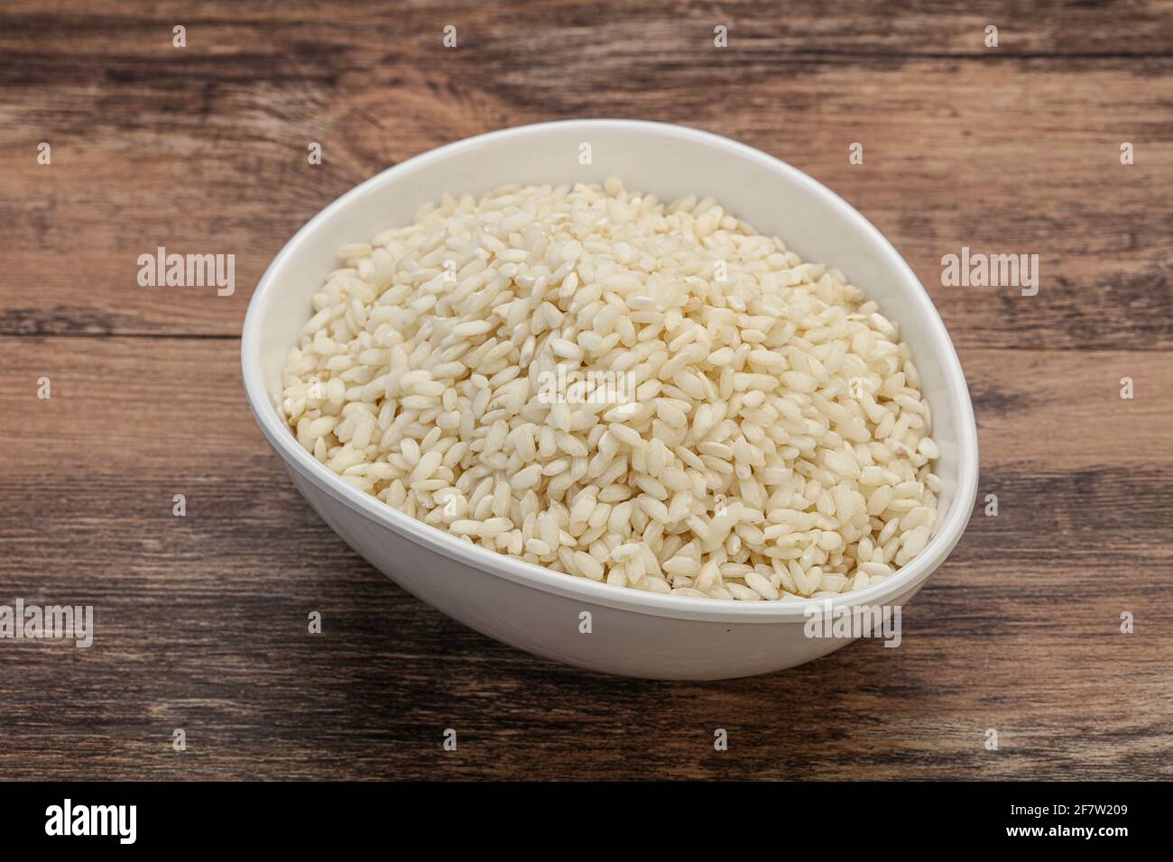 Raw Italian arborio rice for Risotto Stock Photo - Alamy