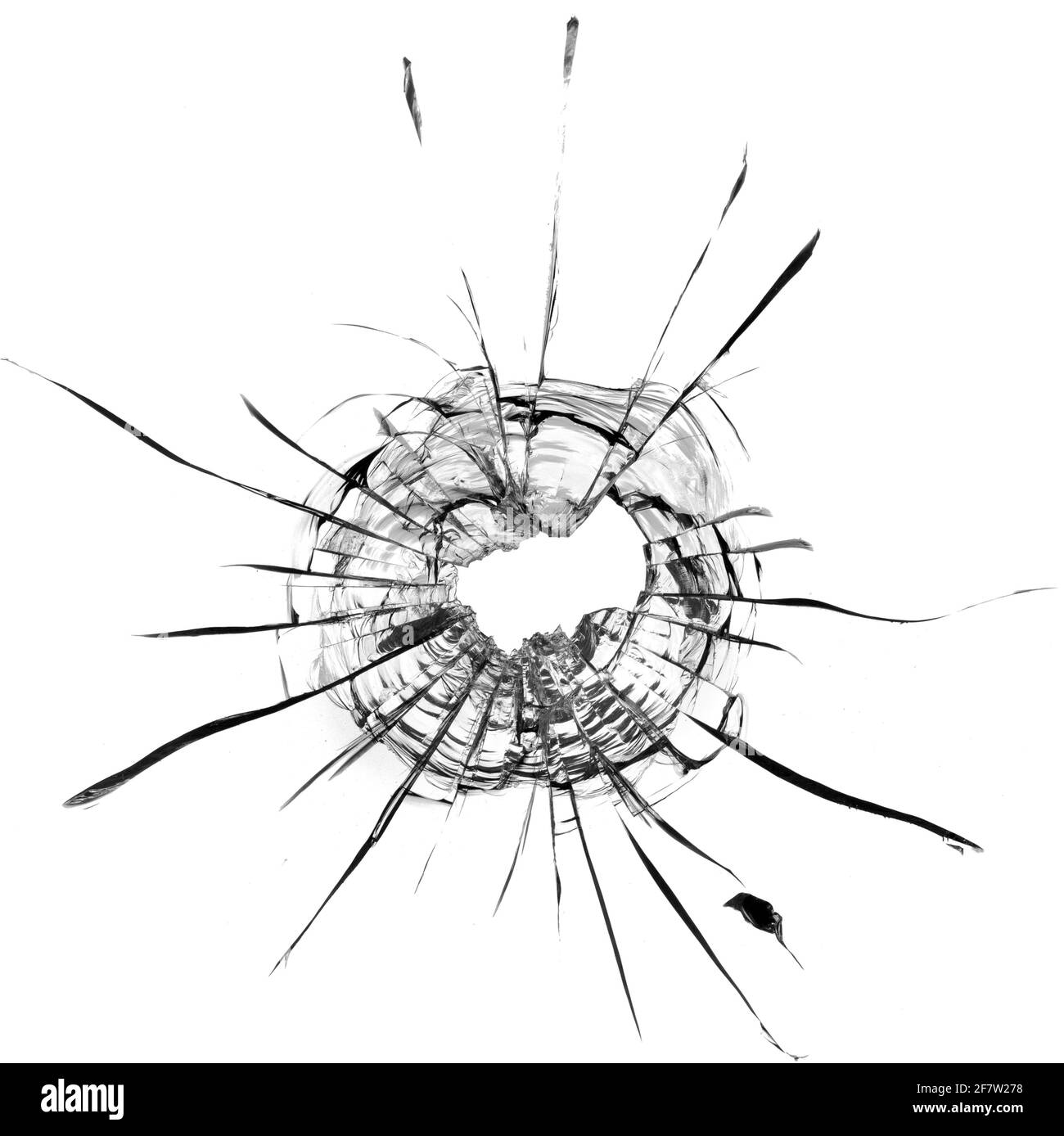 Bullet hole in the glass. Isolated on a white background Stock Photo