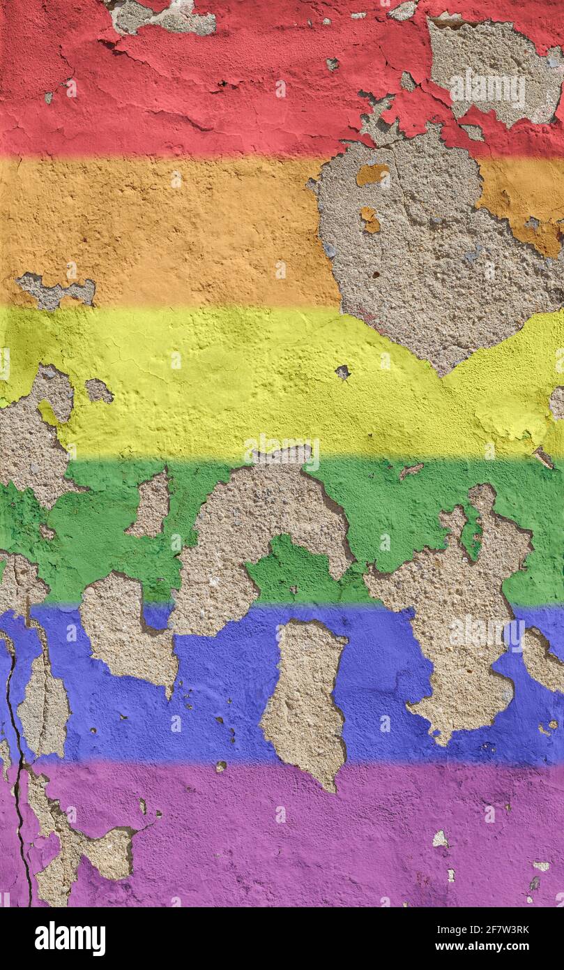 Rainbow colored LGBT pride flag painted on an old and weathered concrete  wall, paint is peeling off. Textured background of a colorful concrete wall  Stock Photo - Alamy