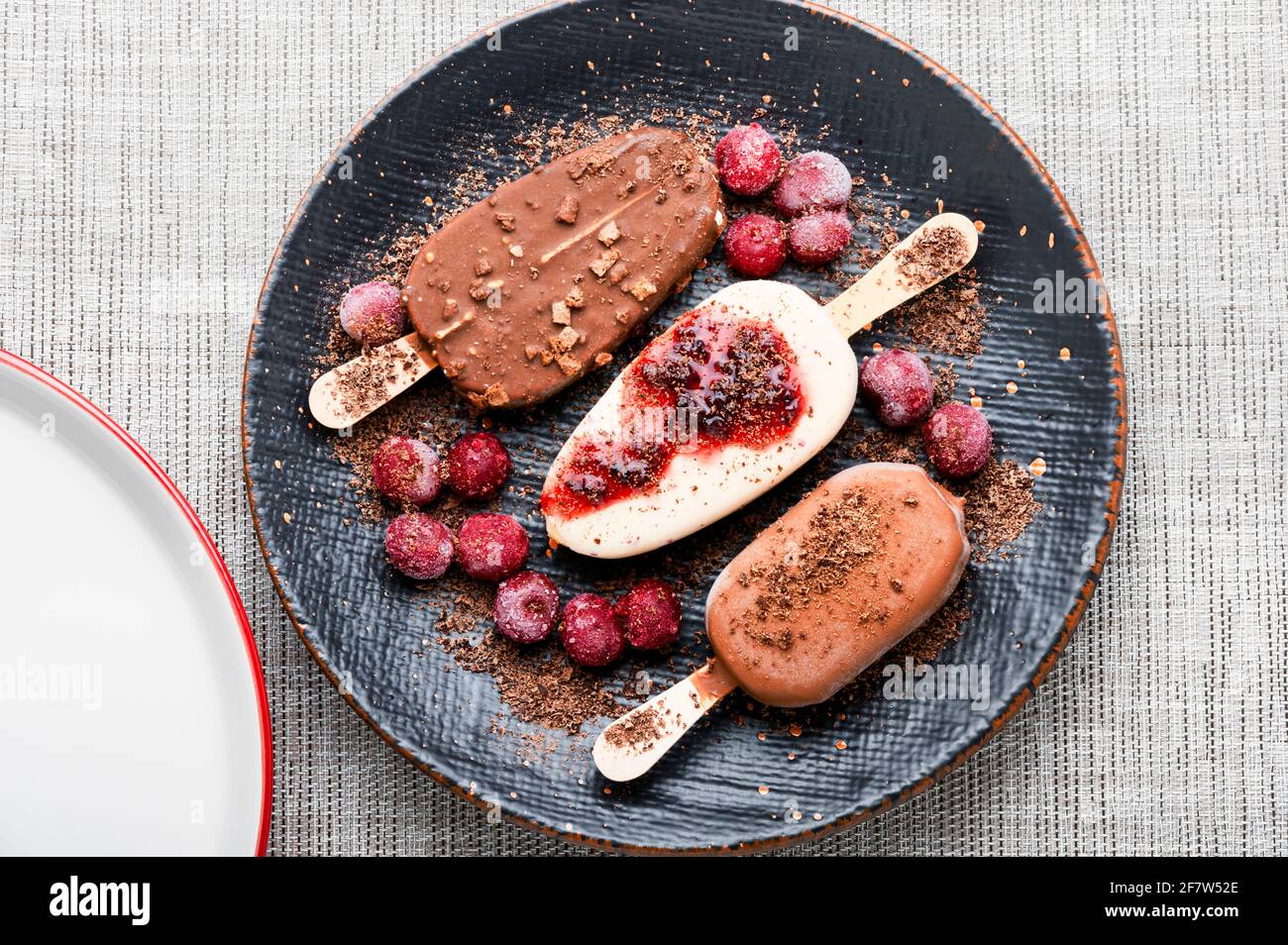 Popsicle ice cream with chocolate and cherry.Ice cream sticks Stock Photo