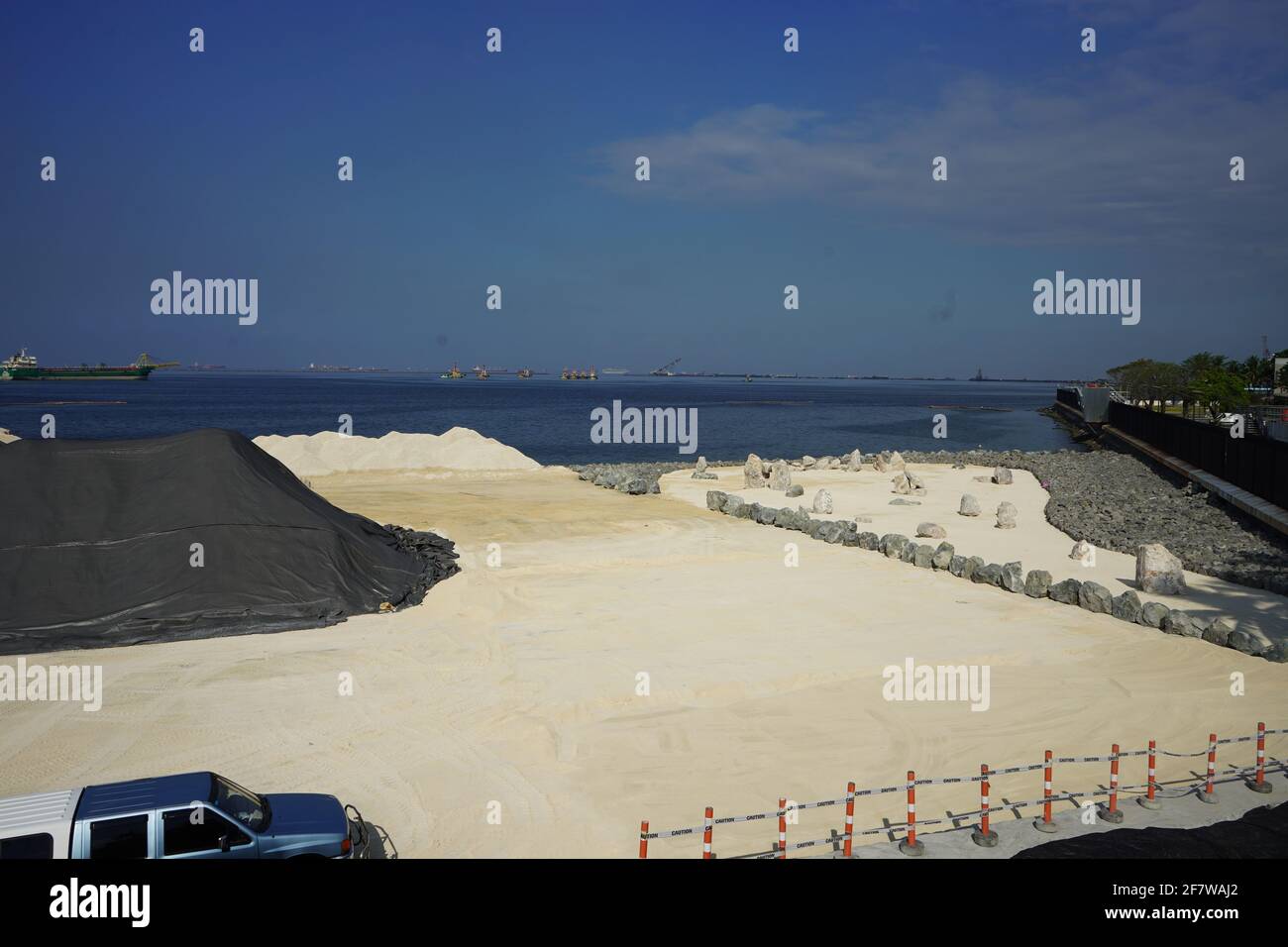 Big rocks were added as ornaments on the ongoing dumping of dolomite on ...