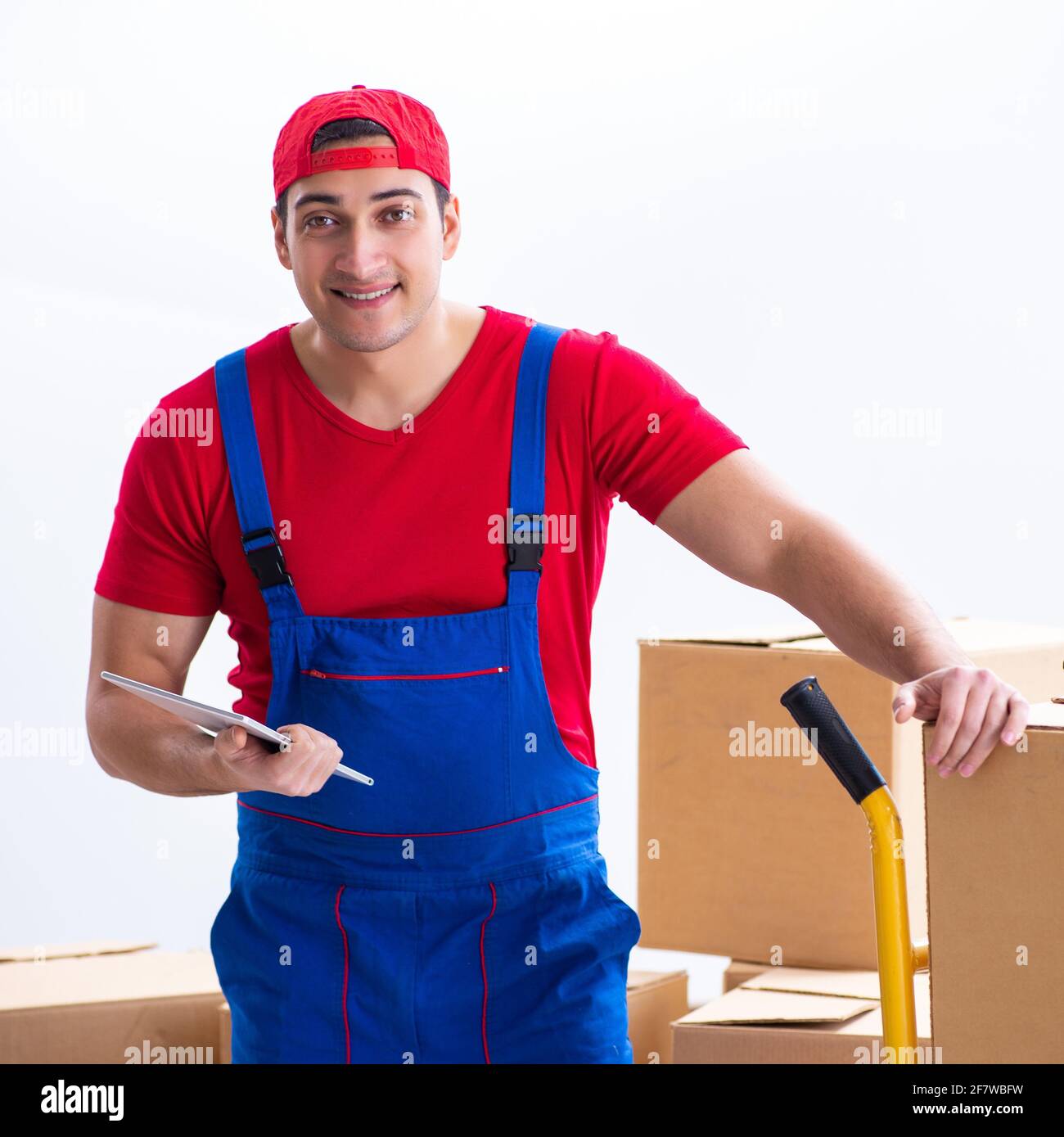 The contractor worker moving boxes during office move Stock Photo