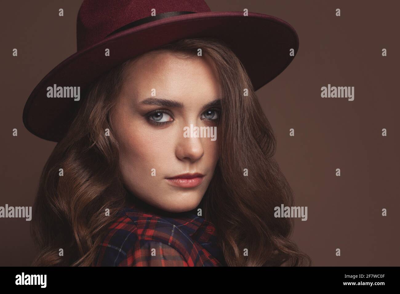 Beautiful woman in fedora hat portrait Stock Photo Alamy