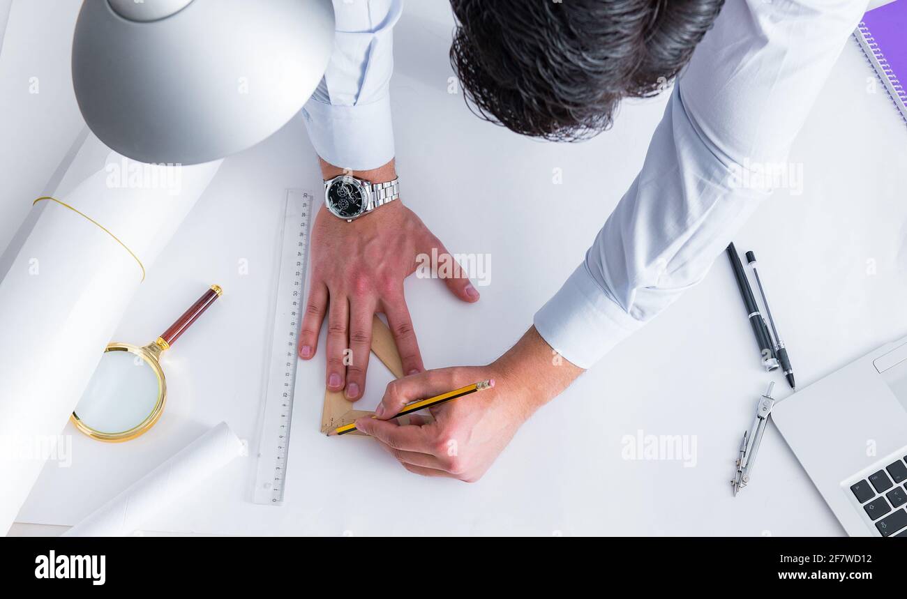 Workign Drawing Engineering The engineer working on new project drawings Stock Photo - Alamy