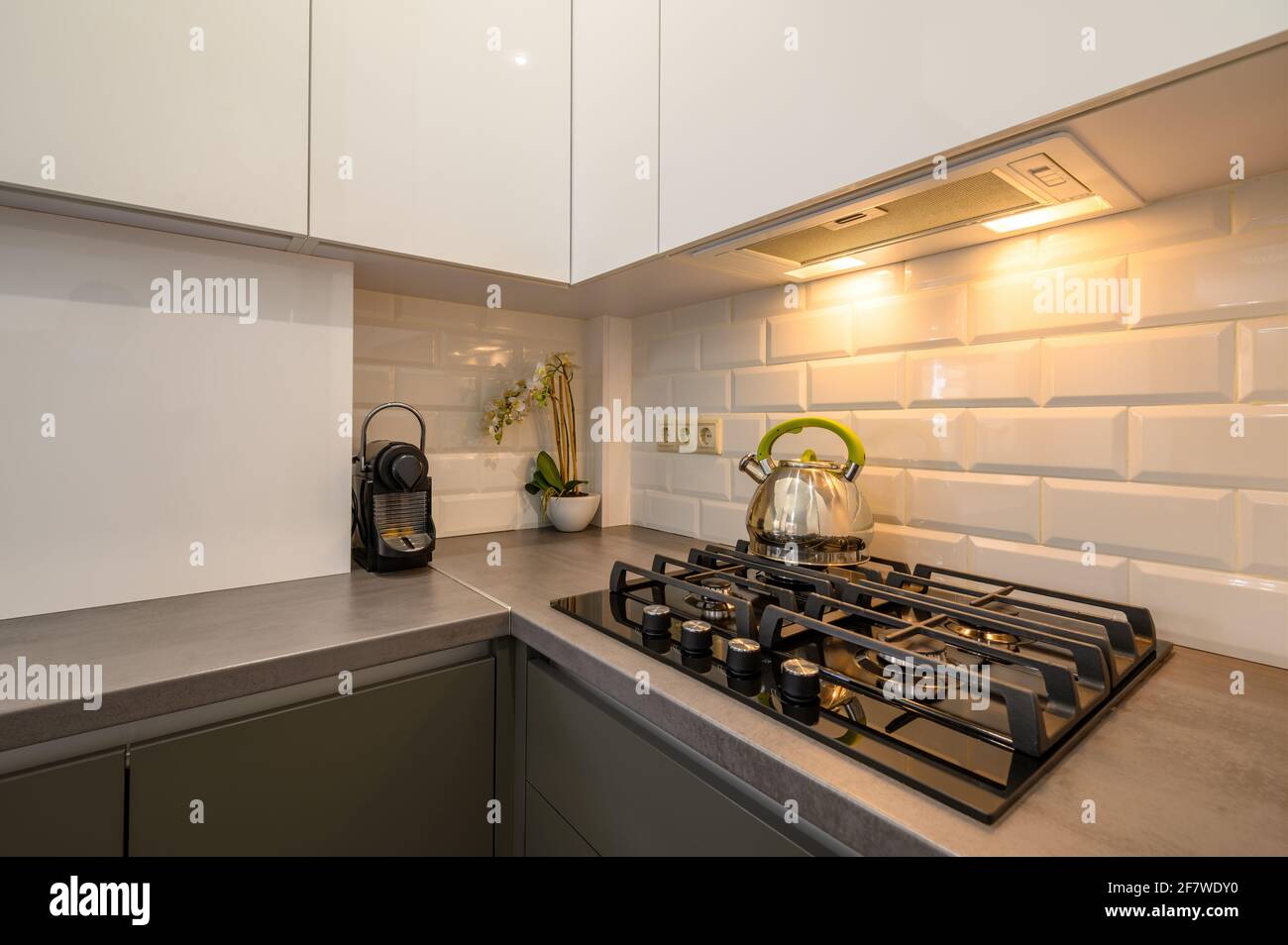 Modern dark grey small kitchen interior Stock Photo - Alamy