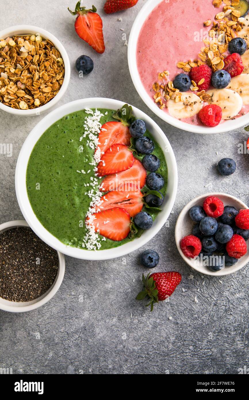 Matcha green tea breakfast superfoods smoothies bowl topped with