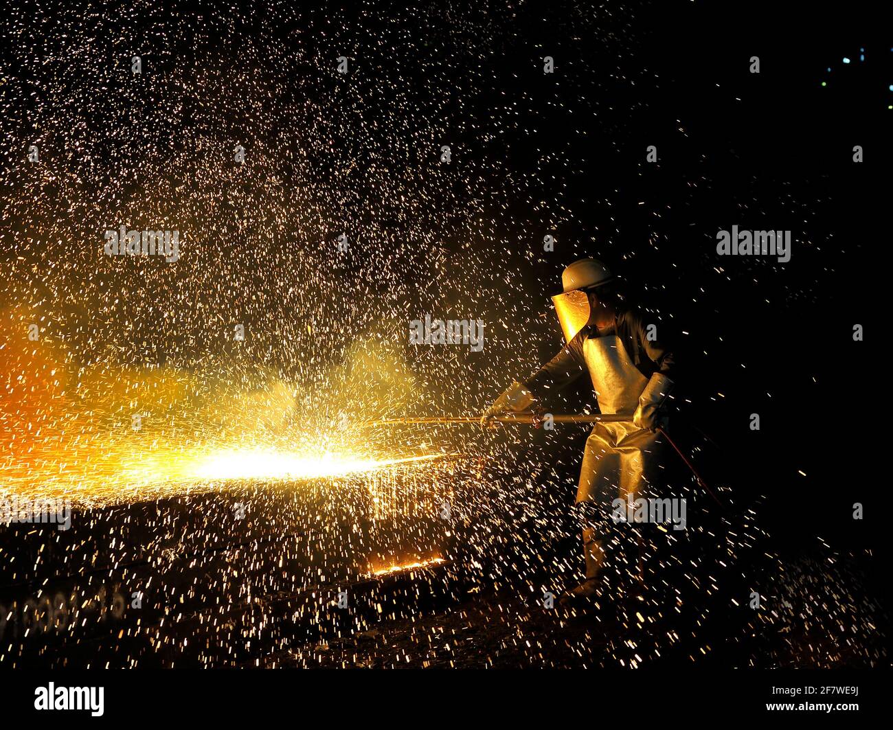 Industrial welder worker in steel plant Stock Photo