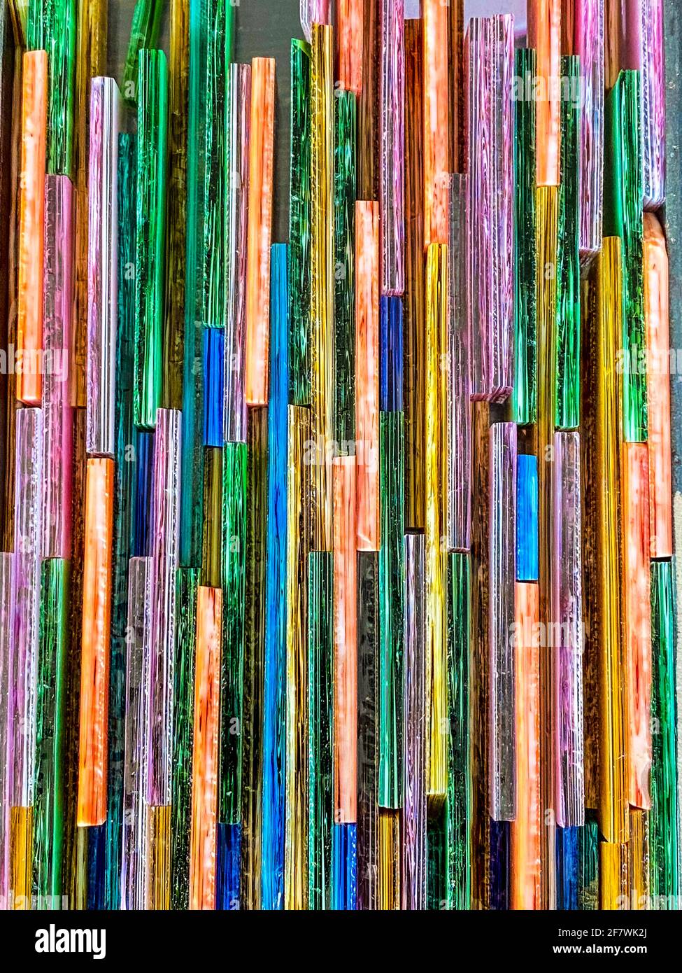 Colorful pieces of stained glass. Focus on foreground Stock Photo