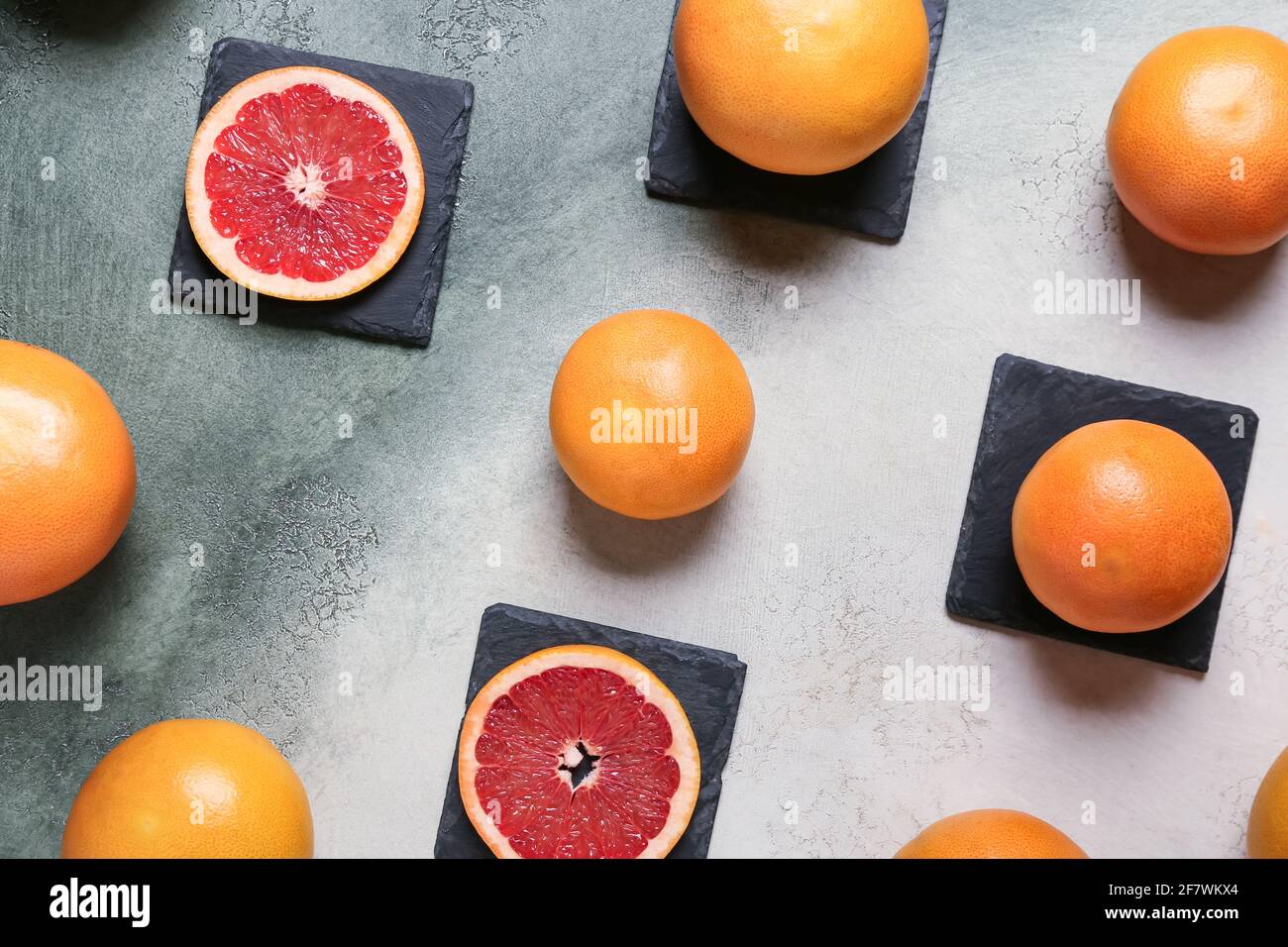 Ripe grapefruits on light background Stock Photo