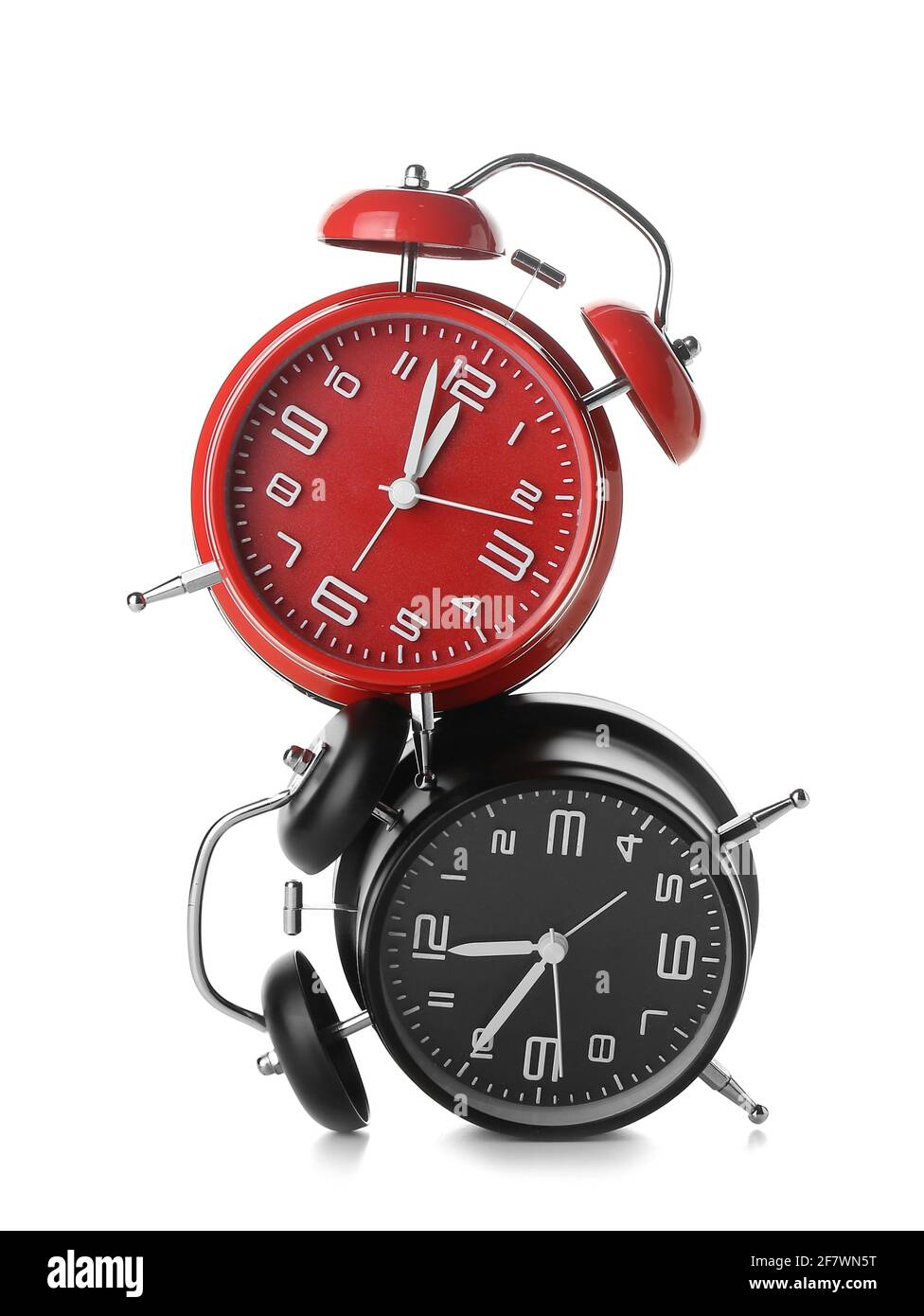Alarm clocks on white background Stock Photo - Alamy