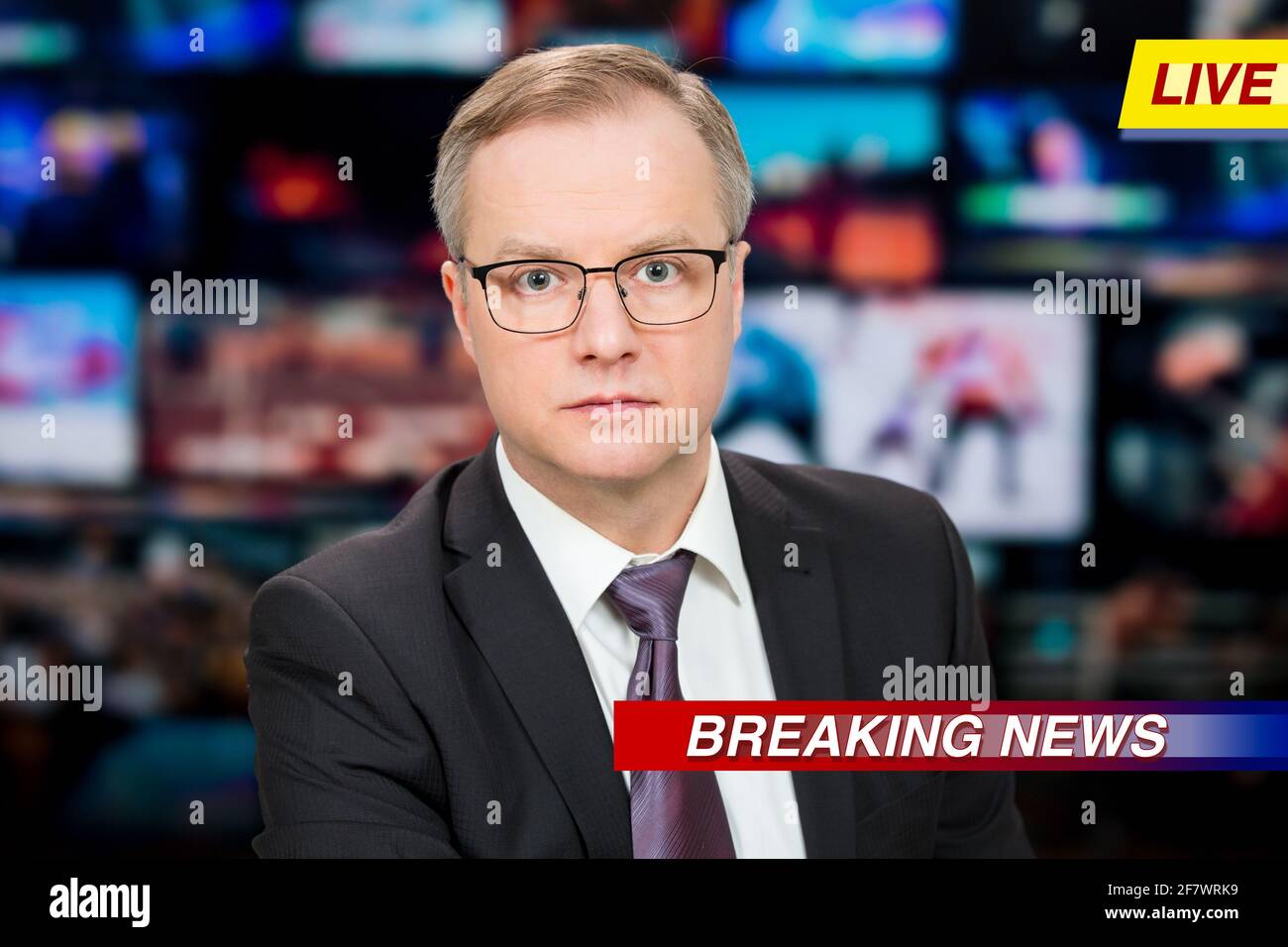 An Anchorman Reporting Live Breaking News Sitting In Tv Studio Background Of Multiple Screens Of Broadcast Control Room Journalism Concept Stock Photo Alamy An Anchorman Reporting Live Breaking News Sitting In Tv Studio Background Of Multiple Screens Of Broadcast Control Room Journalism Concept Stock Photo Alamy